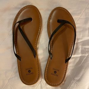 Black flip flop sandals